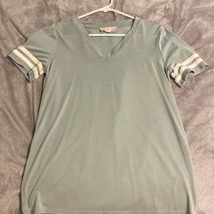 mint green shirt